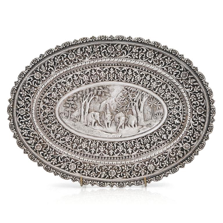 A silver salver, marked OM BHUJ for Oomersi Mawji, Bhuj, Kutch, India, circa 1860-1890.