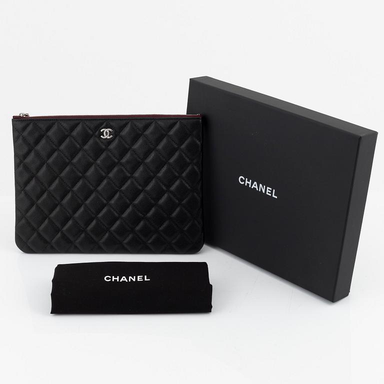 Chanel, a black caviar leather clutch, 2020.