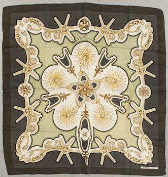 A "Les Eperons" silk scarf by Hermès.