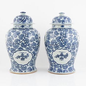 A pair of blue and white porcelain floor urns, China, 20th century.