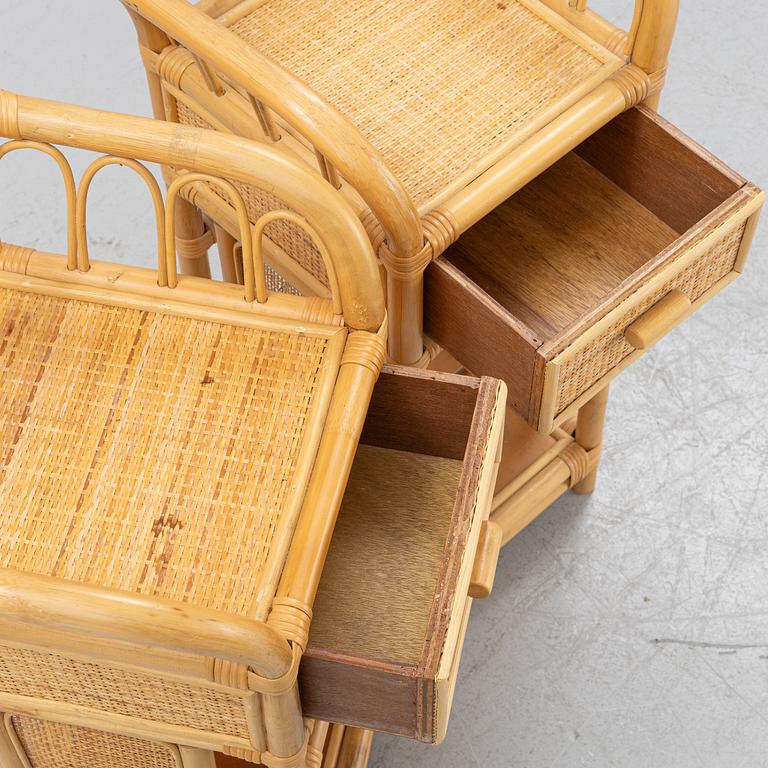 A pair of wicker bedside tables, late 20th century.