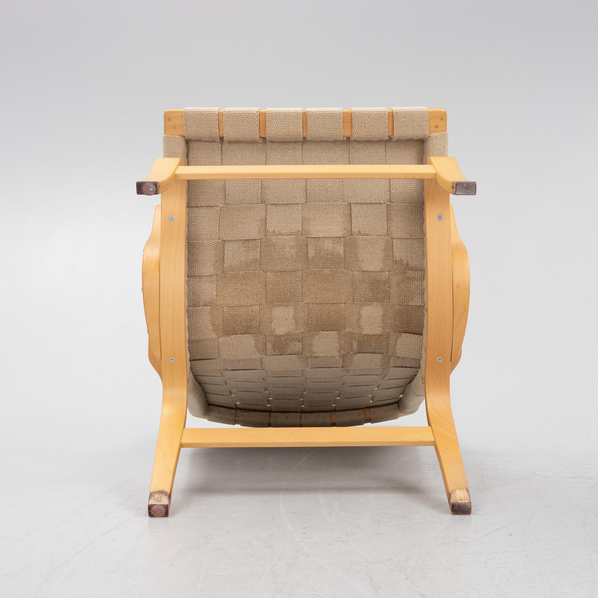 Bruno Mathsson, a pir of 'Eva' armchairs, Dux, late 20th century.