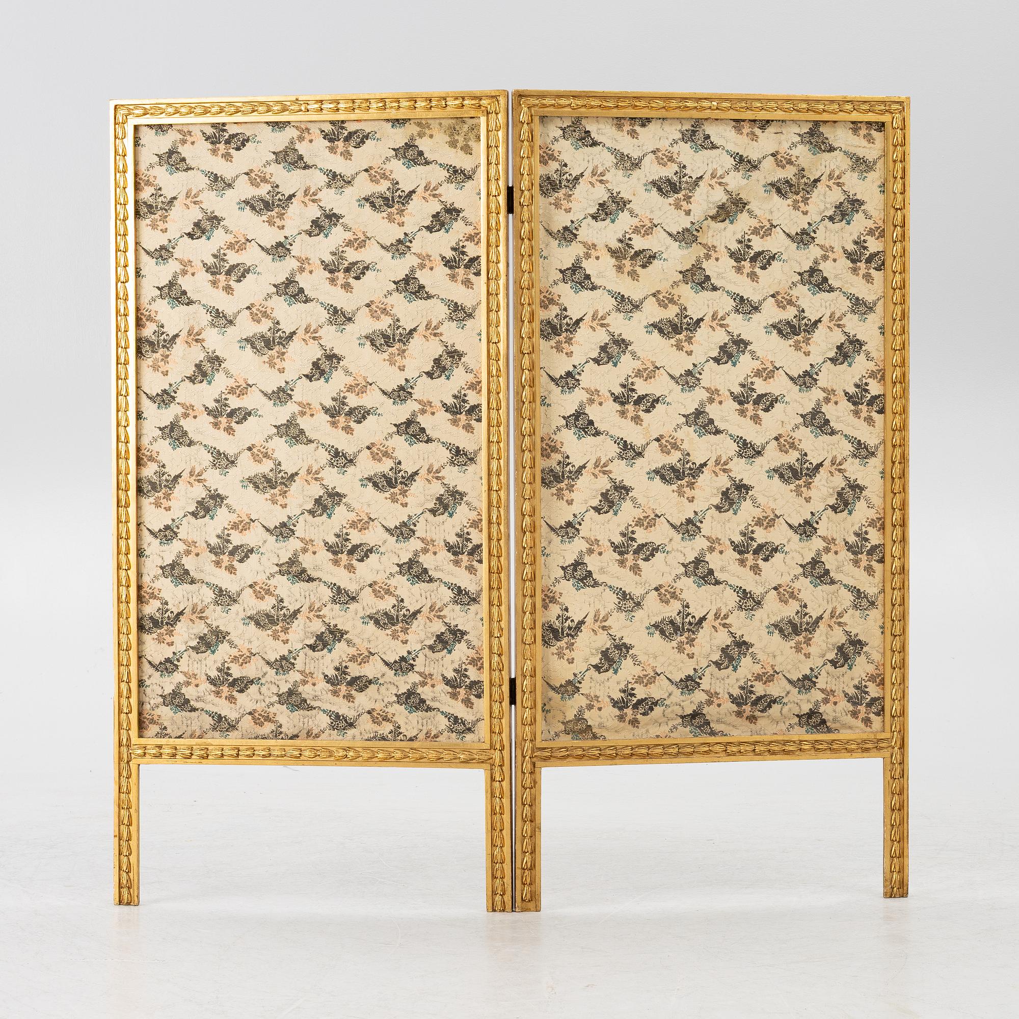 A Louis XVI style folding screen, circa 1900, with fabric from the 18th century.