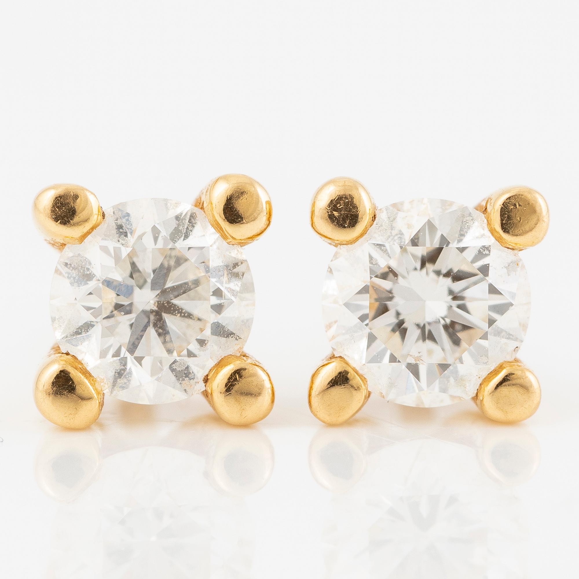 Earrings, a pair, 18K gold with brilliant-cut diamonds.