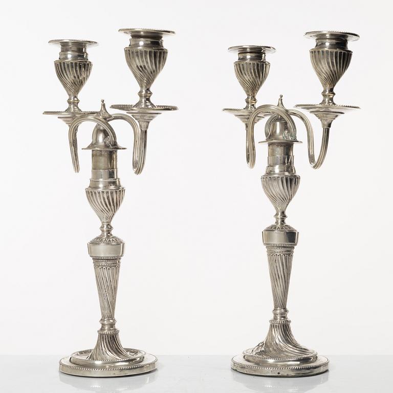 A pair of English silver candelabra, mark of Hawksworth, Eyre & Co Ltd, Sheffield 1892.