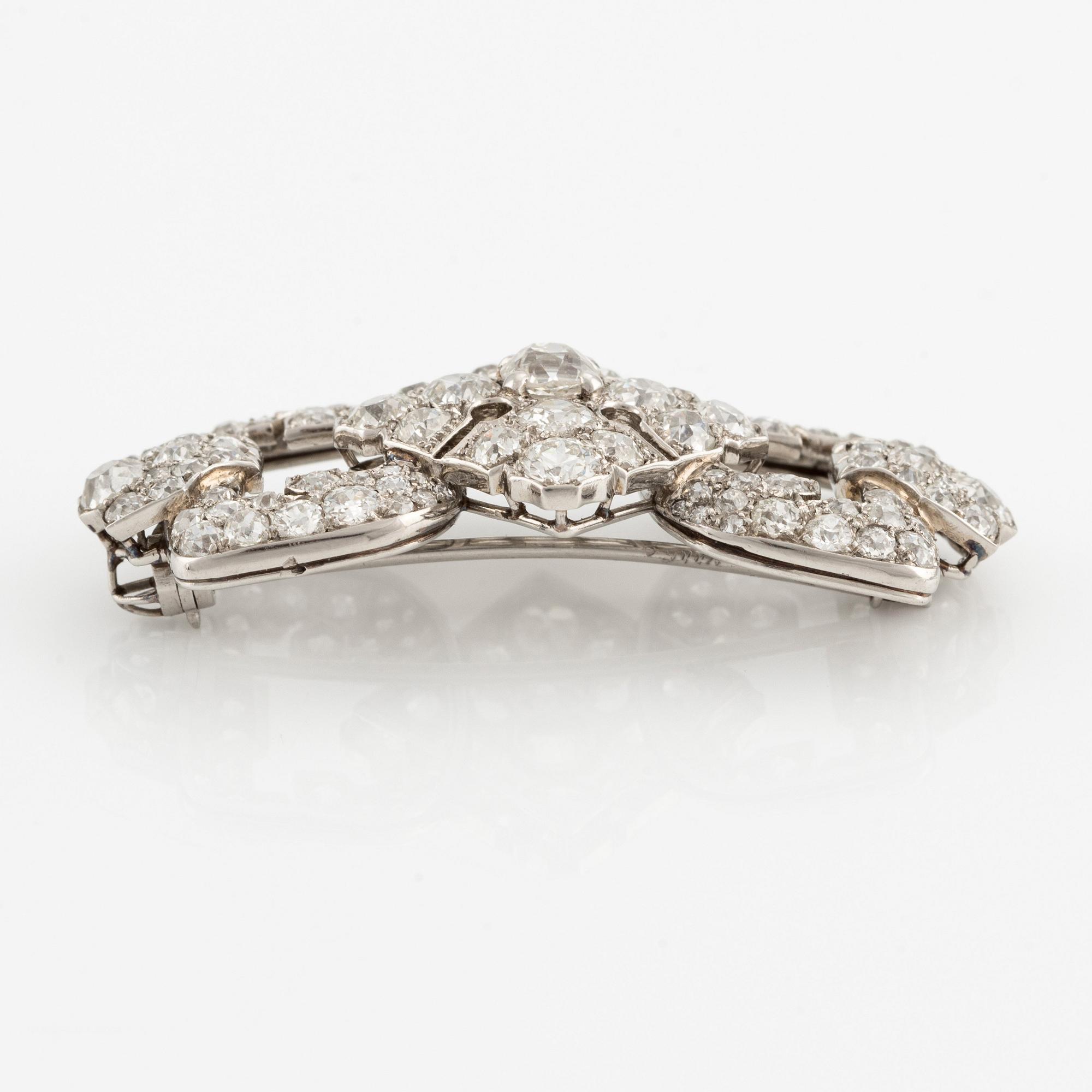 A Cartier platinum brooch set with old-cut diamonds, Art Déco.