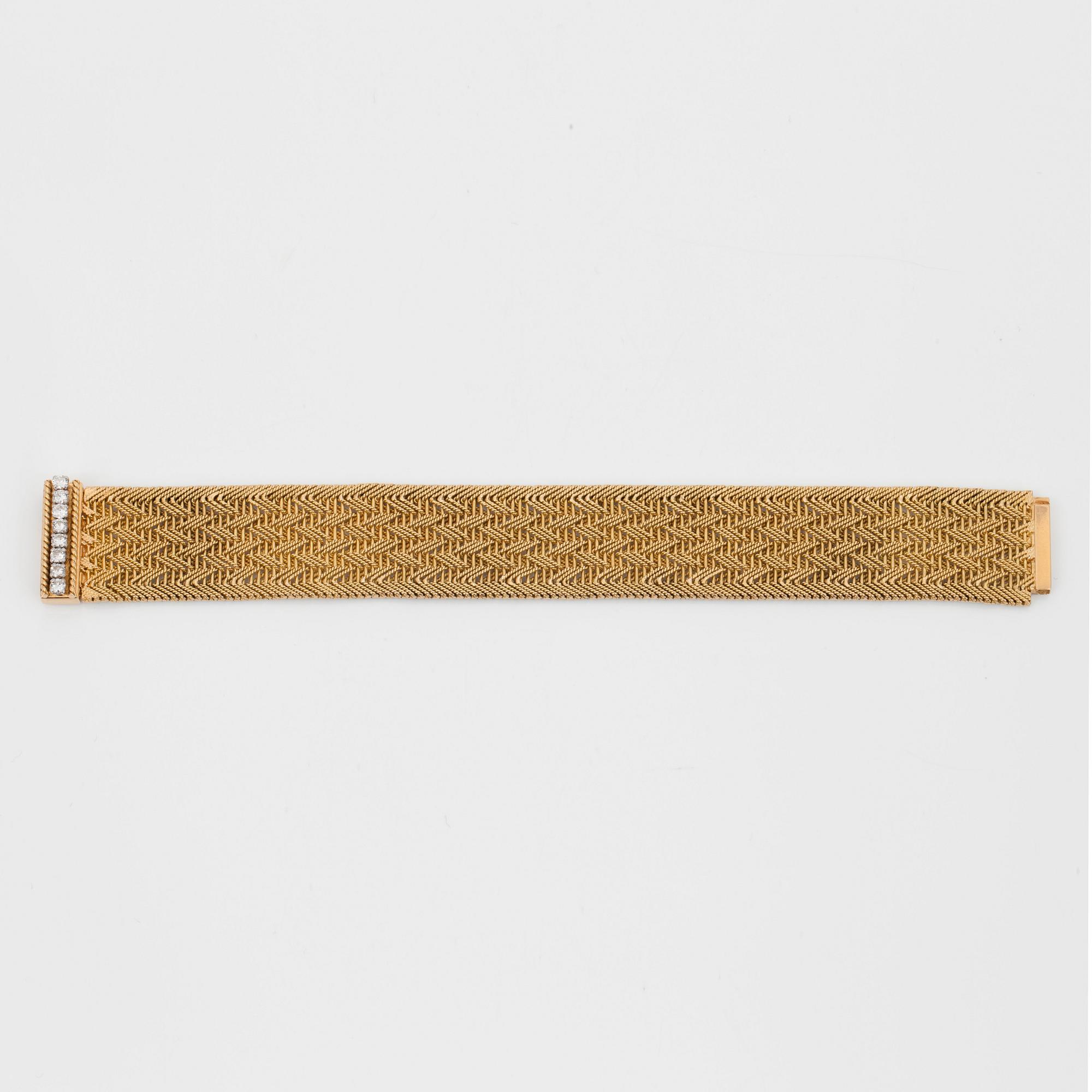 A diamond and gold bracelet. Total carat weight of diamonds circa 0.50ct.