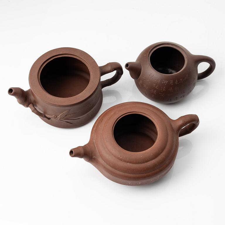 A group of three Chinese yixing teapots, 1960-80s.