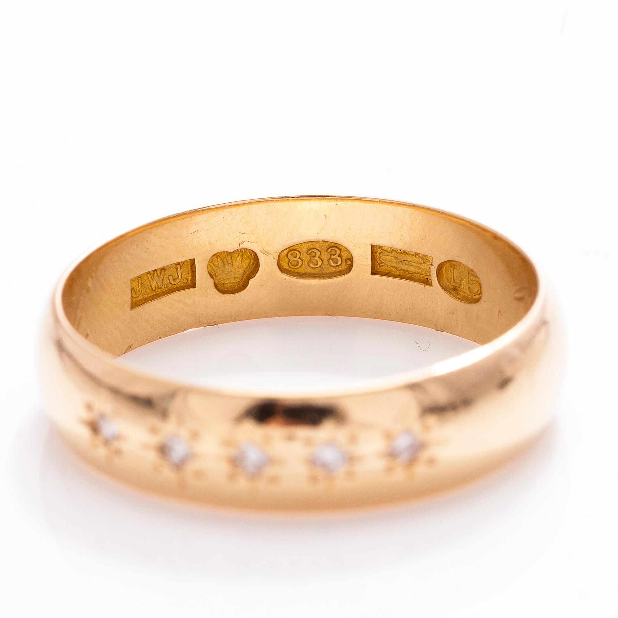 An 20 ct gold ring with diamonds ca. 0.075 ct in total. Johan Wilhelm Jokiniemi (Johansson), Uusikaupunki, Finland 1916.