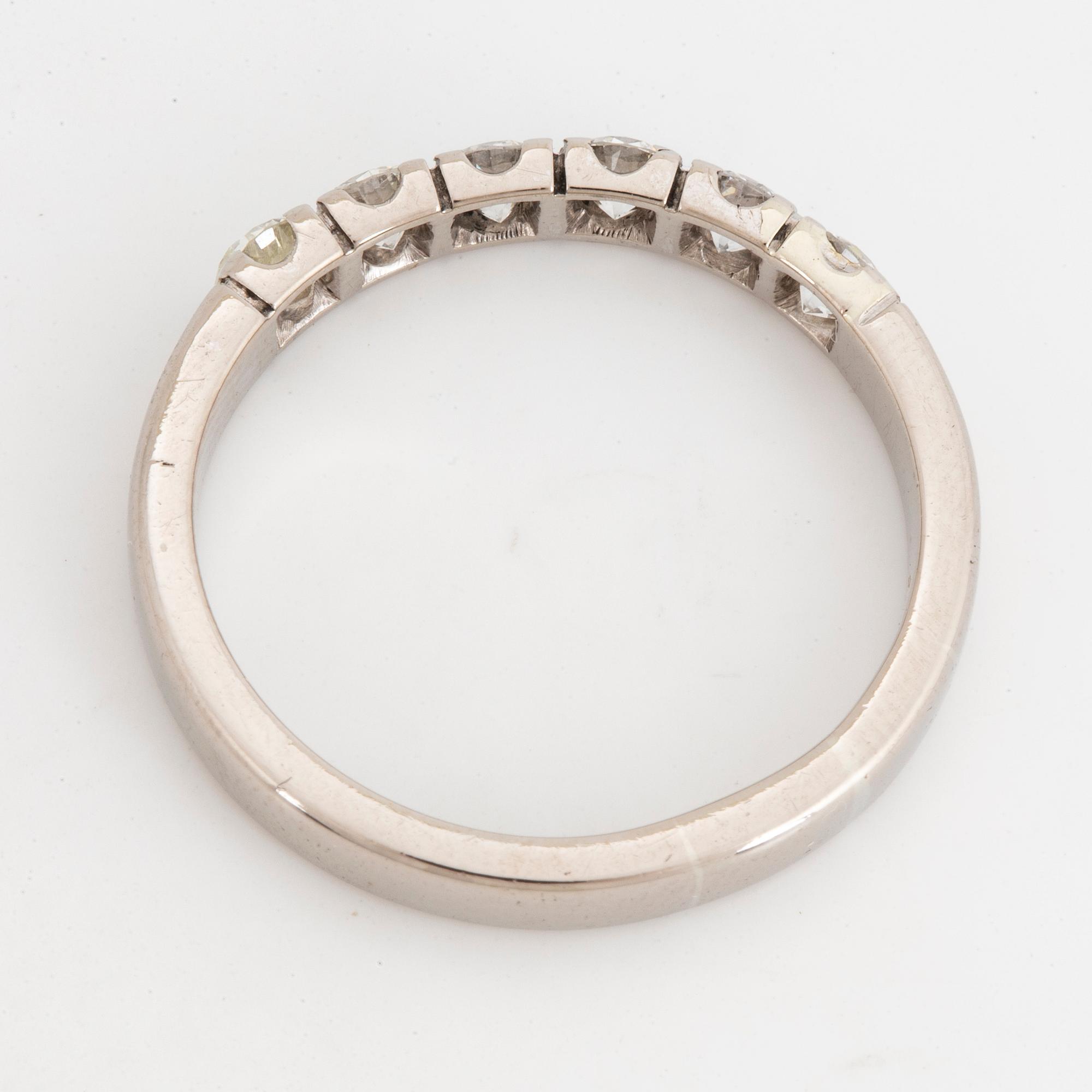 Half eternity brilliant-cut diamond ring.