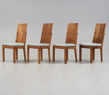 A set of four Axel Einar Hjorth stained pine 'Lovö' chairs, Nordiska Kompaniet, Sweden 1930's.