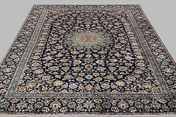 A carpet, Kashan, ca 391 x 286 cm.