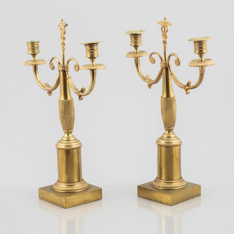 A pair of brass candelabra, first half/mid 19th century.