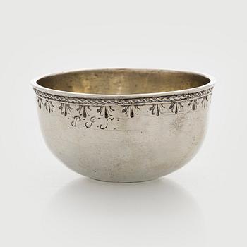 A silver tumbler with inset Swedish coin dated 1713.