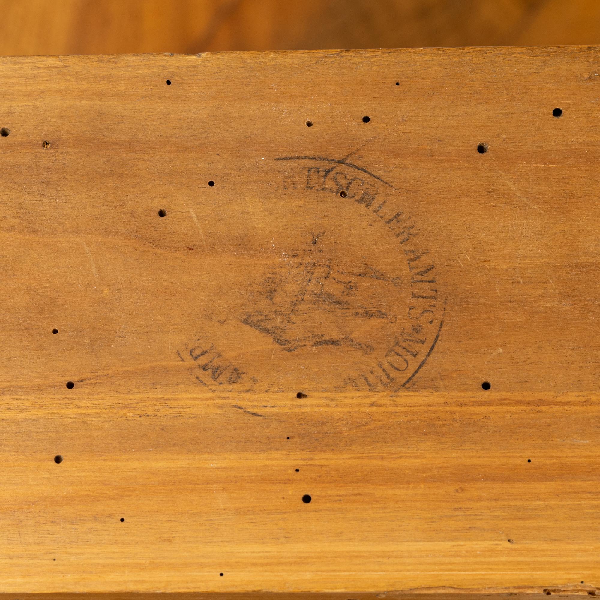 A mahogany veneered table, circa 1800.