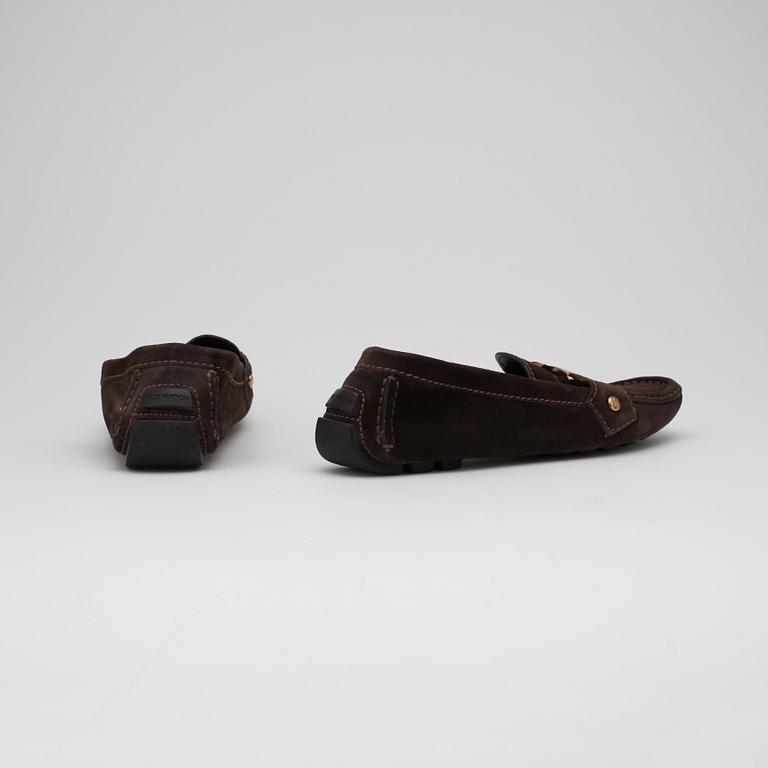 LOUIS VUITTON, a pair of brown suede loafers.