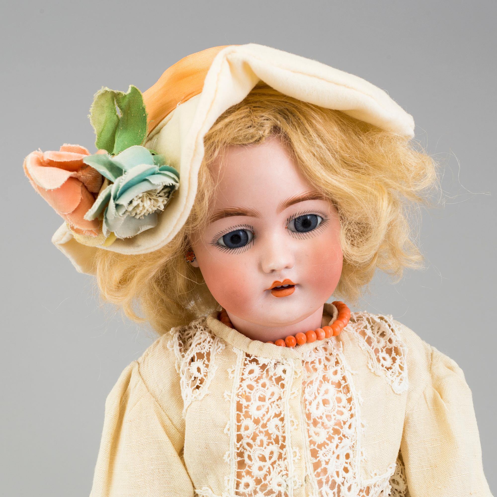 a Franz Schmidt & Co porcellain doll from the early 20th century.