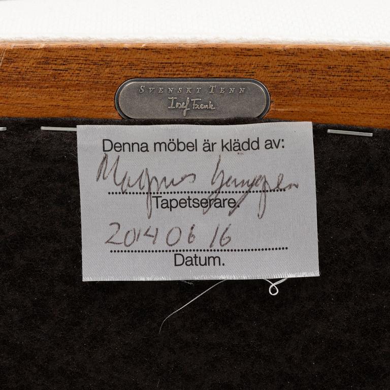 Josef Frank, a pair of armchairs, model 969, Svenskt Tenn.