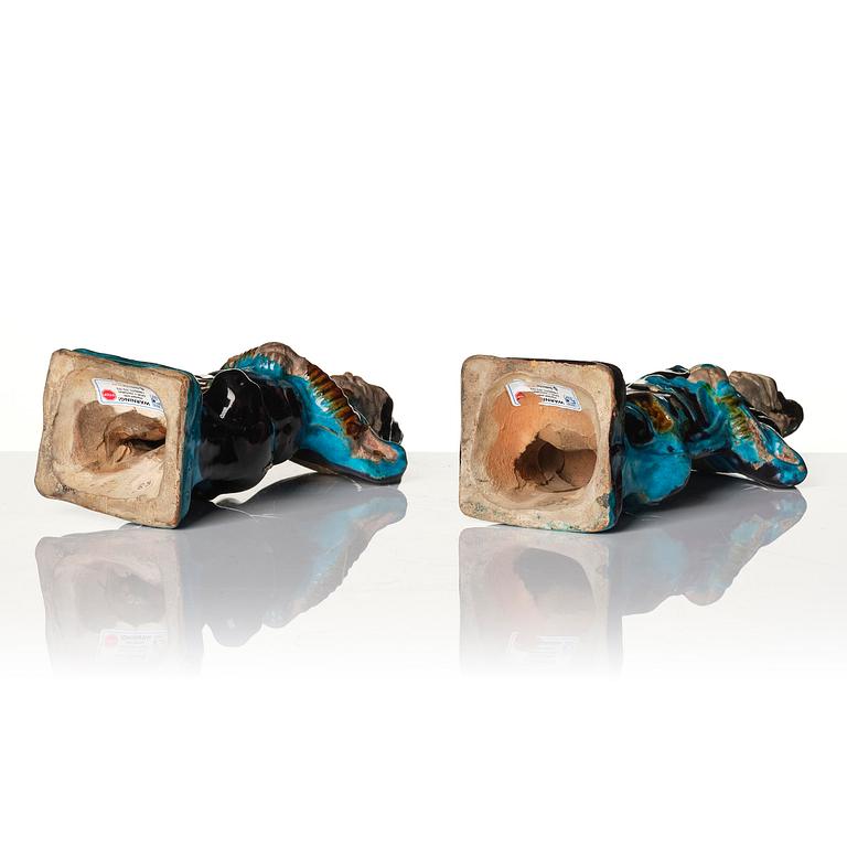 A pair of turquoise and purple glazed figures of guardsmen, Ming dynasty (1368-1644).