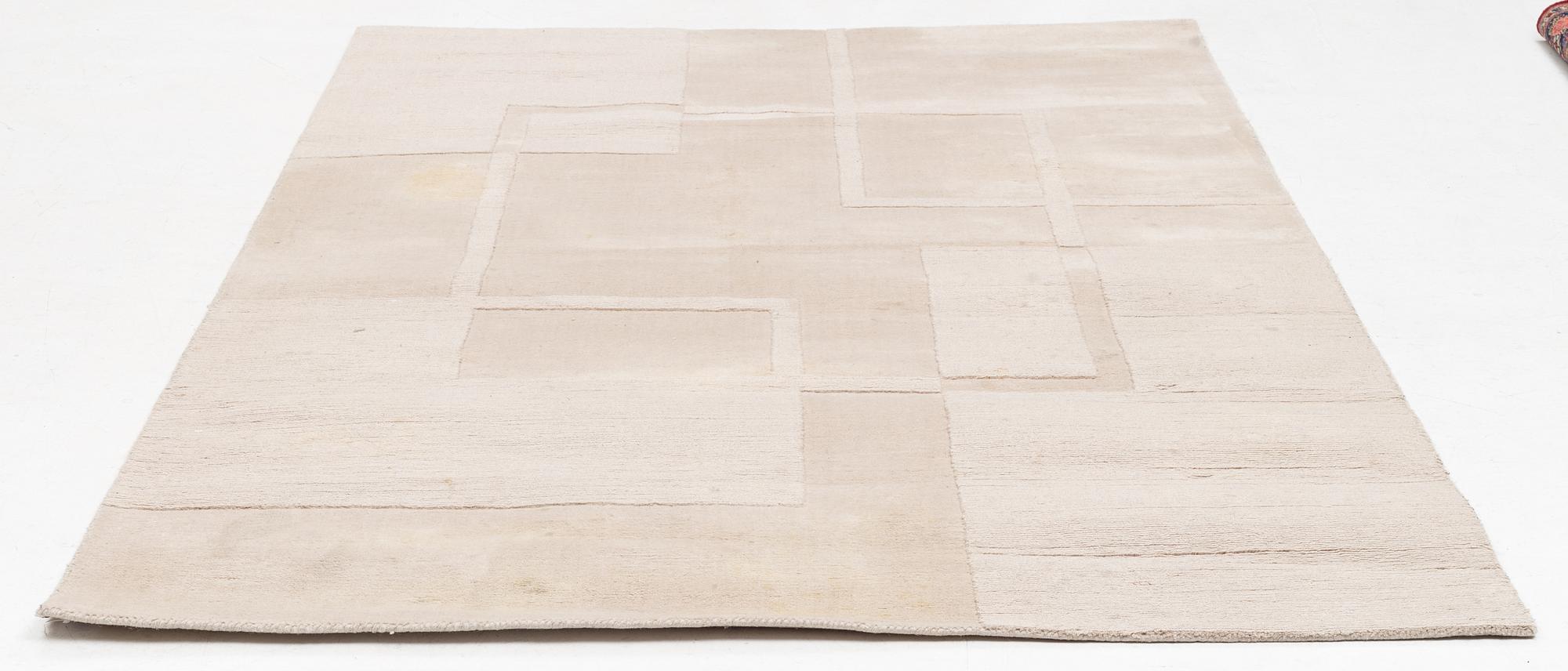 A 'Swedish Grace' carpet, Layered, cox. 270 x 180 cm.