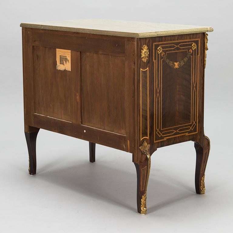 A Swedish Louis XVI-style chest of drawers, signed Arthur Karlström, Lysekil, Sweden, dated 1946.