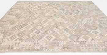 A carpet, Kilim, approx. 400 x 316 cm.