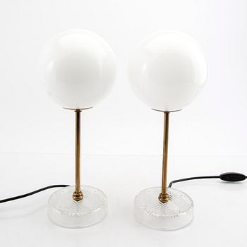 A pair of table lamps later part of the 20 the century.