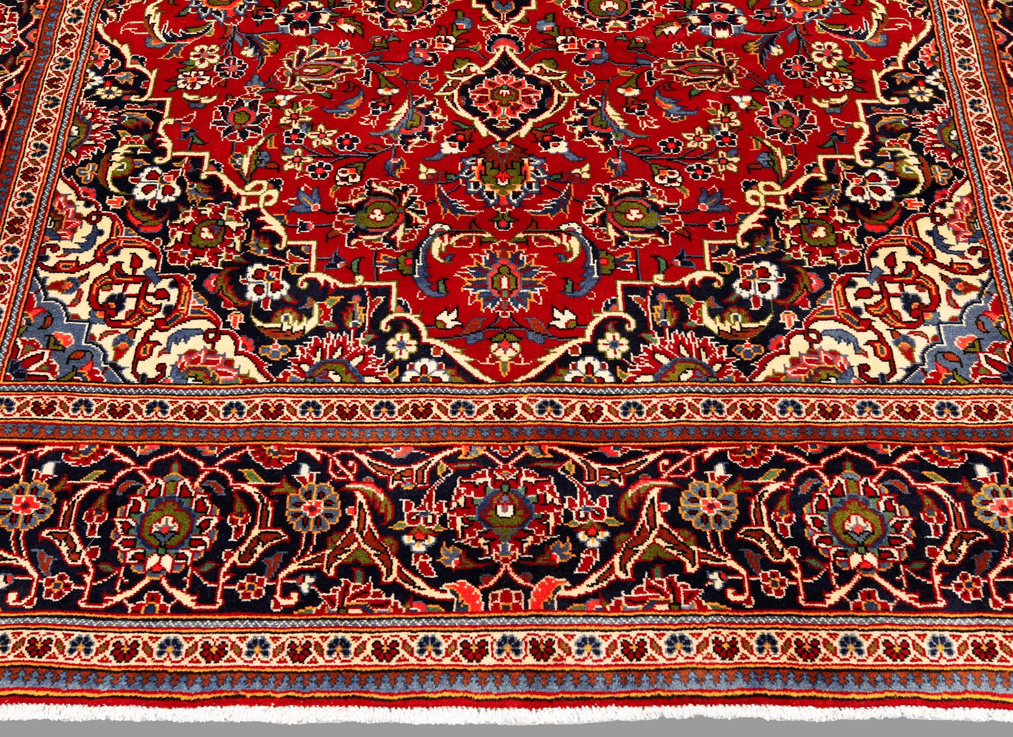 A Keshan carpet, 304 x 203 cm.