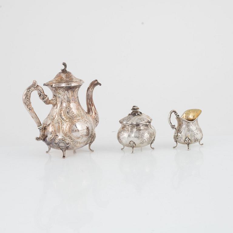 A Swedish silver coffee pot, sugarbowl and a creamer, including Sven Carlsson, Stiltenn, Stockholm 1968.