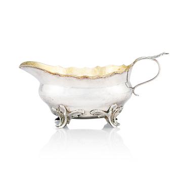 196. A Swedish 18th Century Rococo parcel-gilt silver cream-jug, marks of Anders Mårdh, Kungsbacka, probably 1784.
