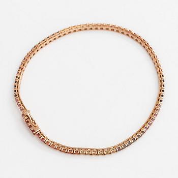 An 18K rose gold tennis bracelet with multi-coloured treated diamonds ca. 2.41 ct tot. according to engraving.