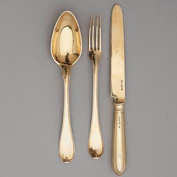 A Swedish 19th / 20th century 36 piece silver-gilt dessert-cutlery, mark of JP Gonvall, Stockholm 1818-1821 and.
