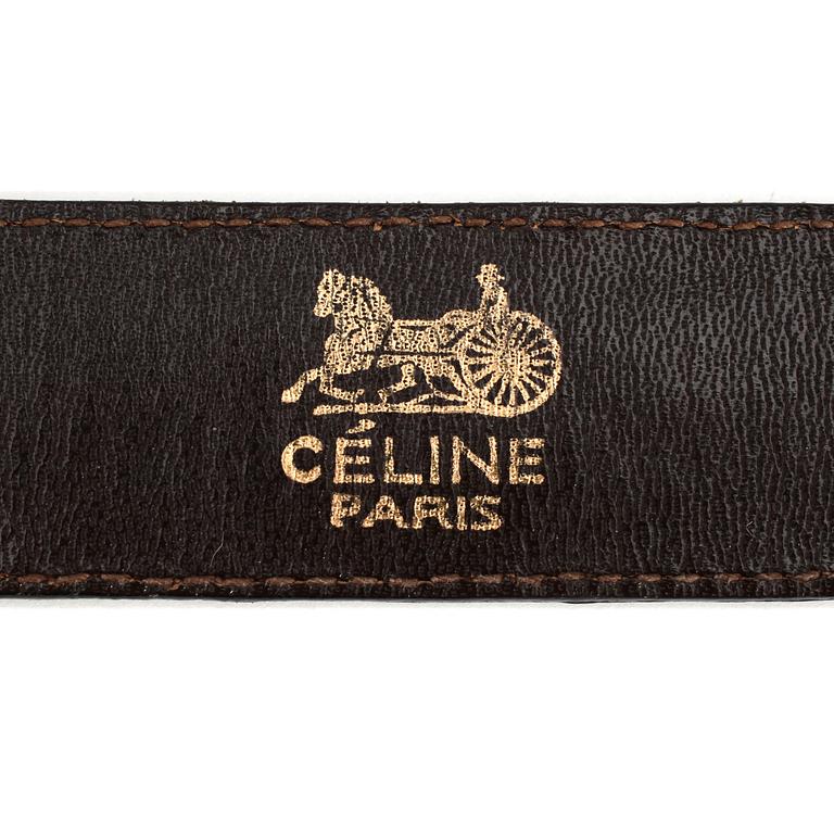 CÉLINE, a pair of brown crocodile shoes and a matching belt.