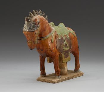 A glazed pottery figure of a horse, Ming dynasty.