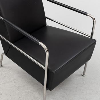 Gunilla Allard, a pair of leather upholstered 'Cinema' easy chairs, Lammhults.