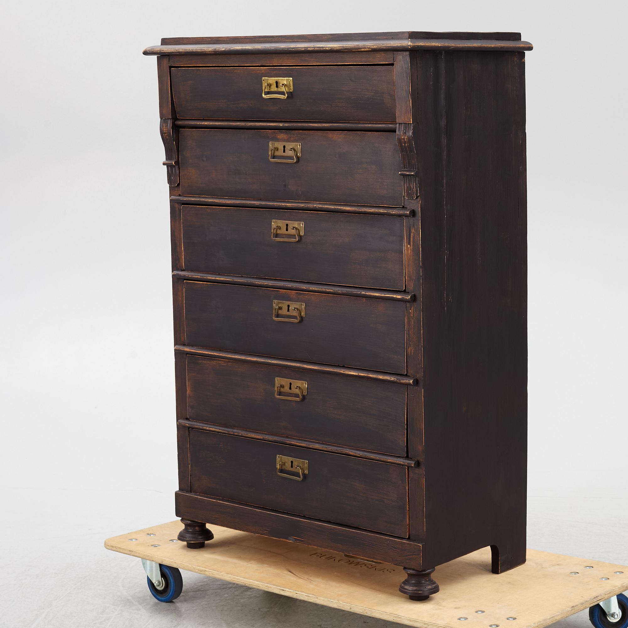 A chest of drawers, circa 1900.
