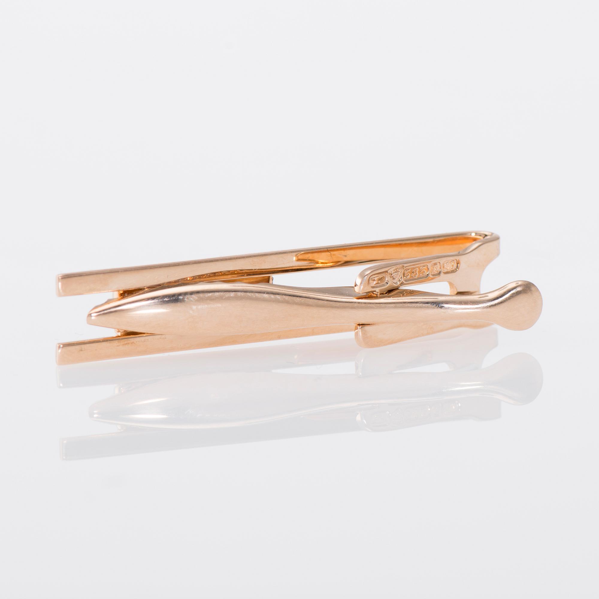 SLIPSNÅL, 14K guld, tigeröga. Elis Kauppi, Kupittaan kulta. Vikt ca 6,3 g.