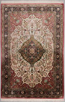 A SILK CARPET, Ghom, 313x206 cm.