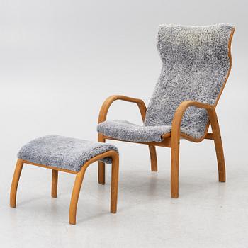 Jan Ekström, armchair with footstool "Gazelle", Conform, 21st century.
