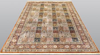 A silk Ghom carpet, 296 x 194 cm.