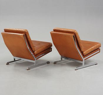 A pair of Poul Nørreklit chromed steel and brown leather easy chairs, Selectform, Denmark 1960's.