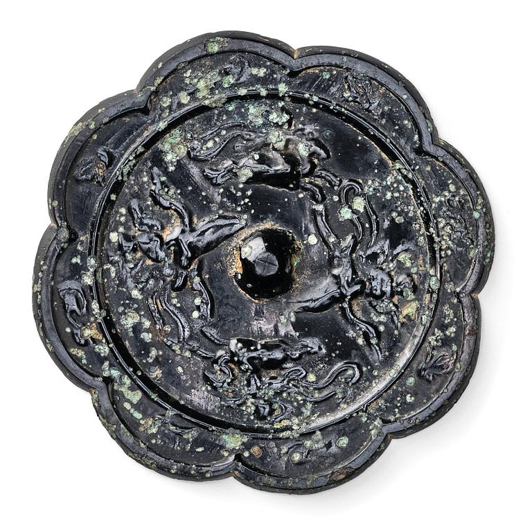 Eight-lobed bronze mirror with mythical animals, Tang dynasty (618–907).