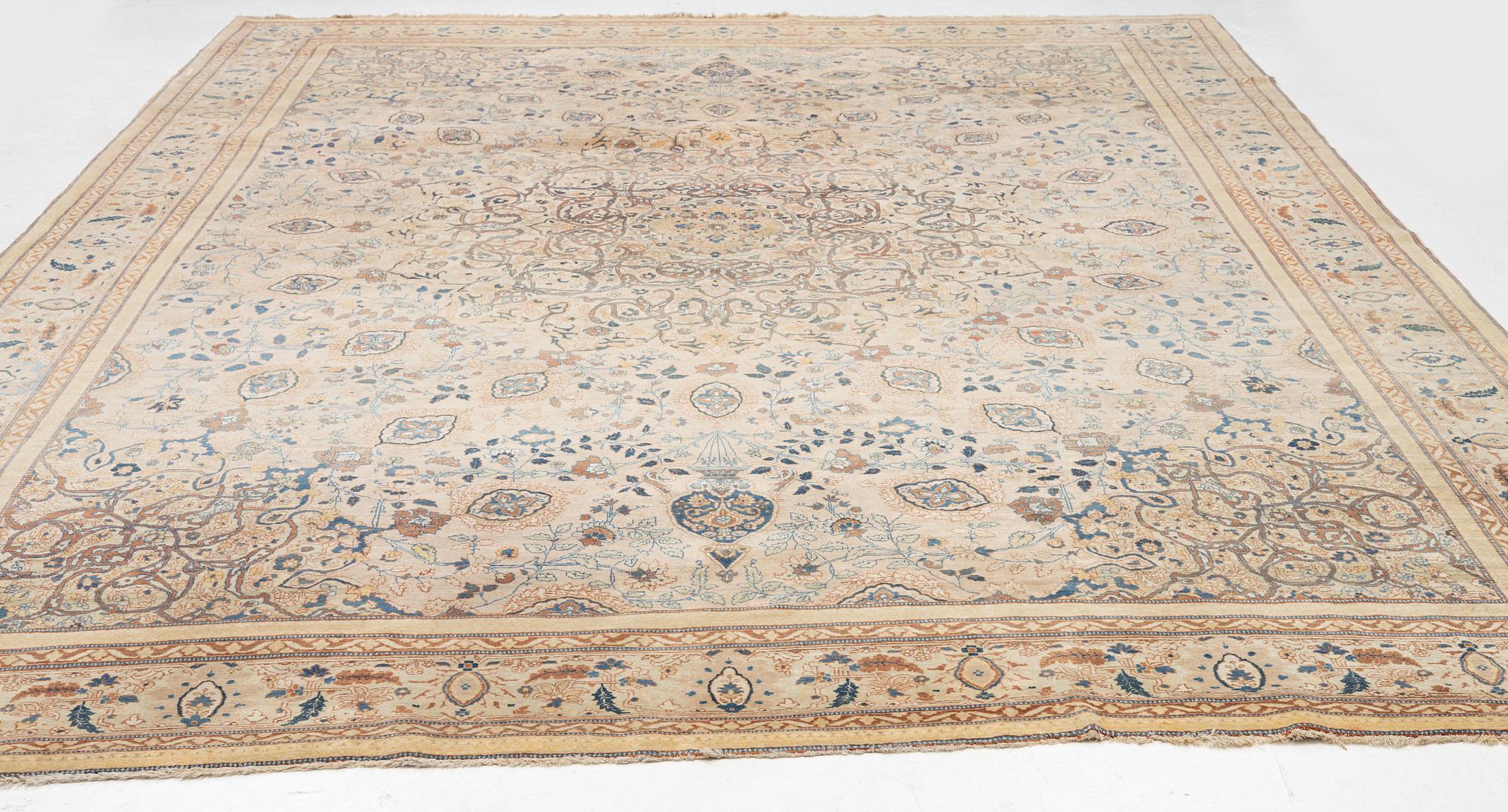 An antique 'Haj Jalili' Tabriz carpet, Northwest Persia, c. 430x310 cm.