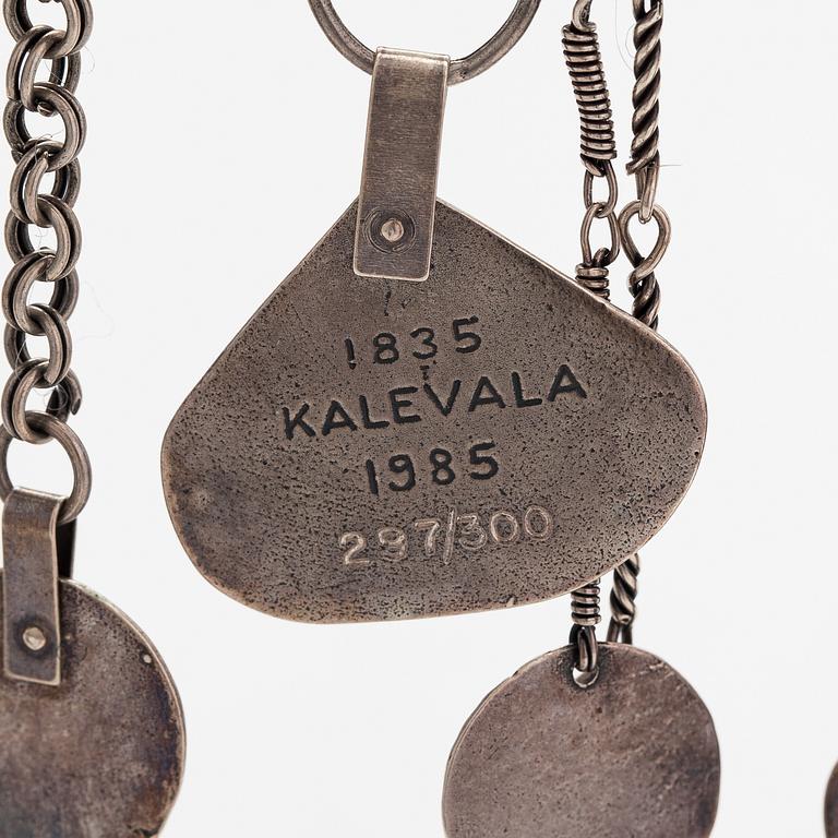 A serling silver Jubilee collier for the 150 years anniversary of the Kalevala epic poetry. Kalevala Koru Helsinki 1985.