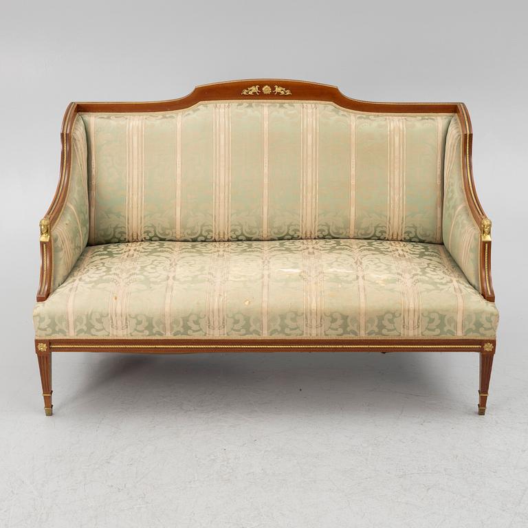 A sofa, two armchairs, four chairs and table, Empire style, 20th century.