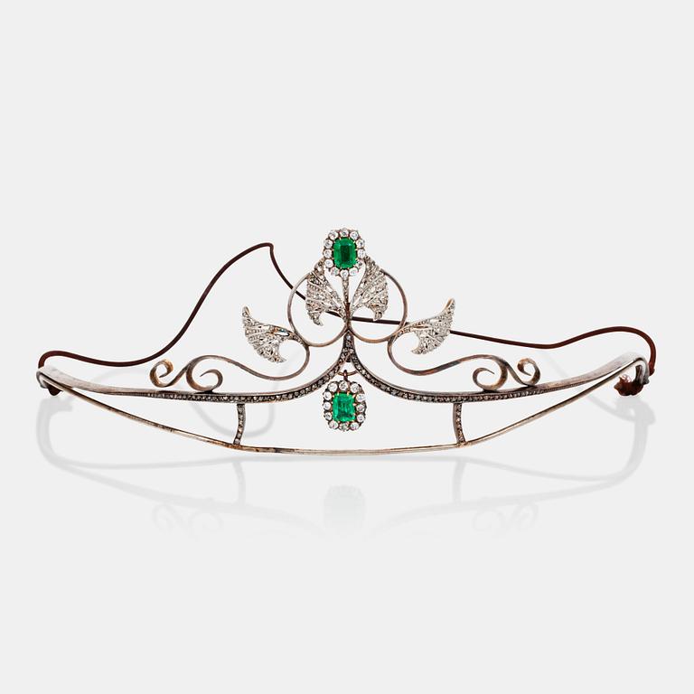 An Art Noveau emerald, old- and rose- cut diamond tiara. Circa 1910.