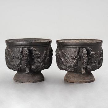 A pair of Swedish cast iron plant pot with the monogram of Queen Hedvig Eleonora, probably 1920's.