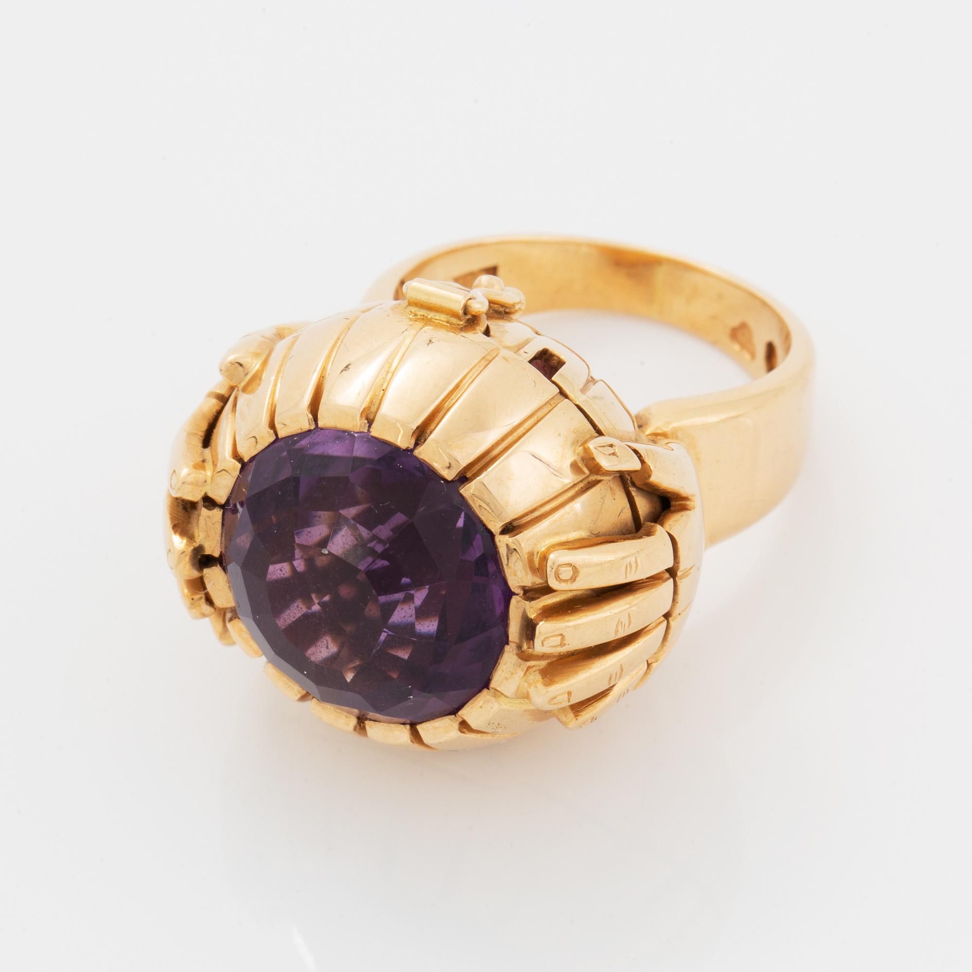 Amethyst ring with locket.