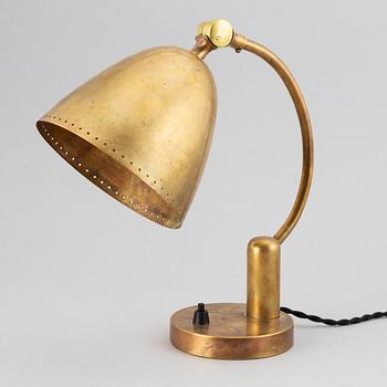 A mid 20th Century brass table light.