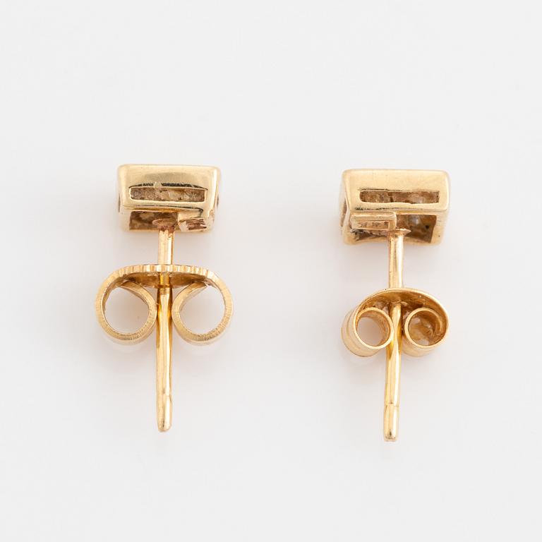 Princess cut diamond earrings.